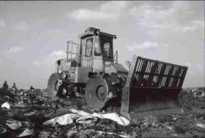Process of Landfill Disposal: Waste Compaction (Credit: Dietrich Krieger 2014)