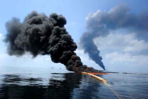 Examples of Water Pollution: Controlled-Burning to Prevent Spread to Spilt Oil in Ocean (Credit: Petty Officer 2nd Class Justin Stumberg 2010)
