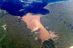 Why Estuaries Are Important: Water Mixing In Estuaries May Dilute Pollutants (Credit: Earth Sciences and Image Analysis Laboratory, NASA Johnson Space Center 2003)