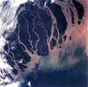 Why Weathering is Important: Aquatic Features like Deltas (such as the Ganges River Delta shown in this Image) and Alluvial Plains can be Partly Attributed to Weathering (Credit: NASA 1994)